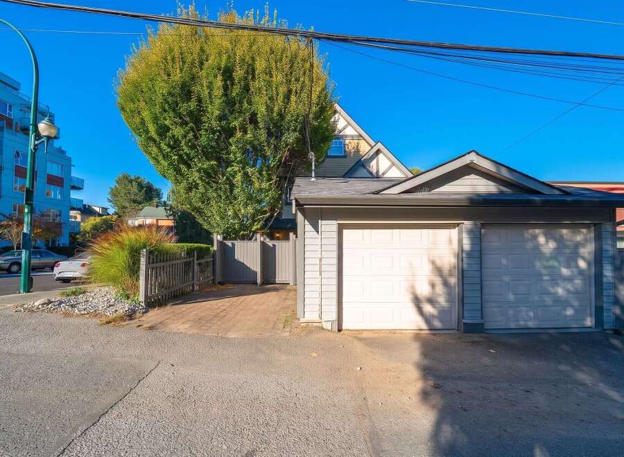 Discover this charming property featuring a spacious two-car garage, perfect for vehicles or extra storage.
