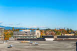 Discover this prime real estate opportunity with a sprawling rooftop offering panoramic views of the surrounding cityscape and distant mountains.