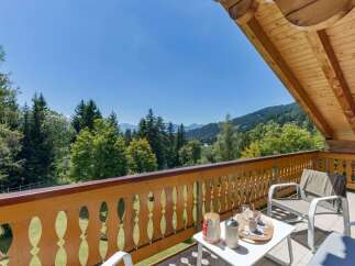 Enjoy breathtaking mountain views from this charming balcony, perfect for your morning coffee or evening relaxation.