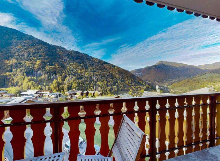 Enjoy breathtaking mountain views from this charming balcony, perfect for your morning coffee or evening relaxation.
