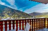 Enjoy breathtaking mountain views from this charming balcony, perfect for your morning coffee or evening relaxation.