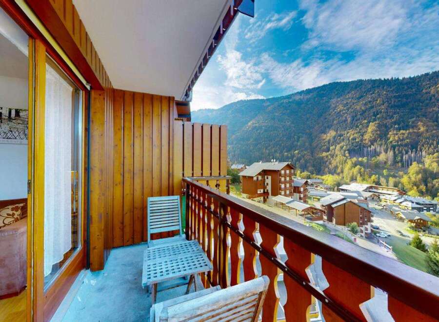 Enjoy breathtaking mountain views from this charming balcony, perfect for your morning coffee or evening relaxation.