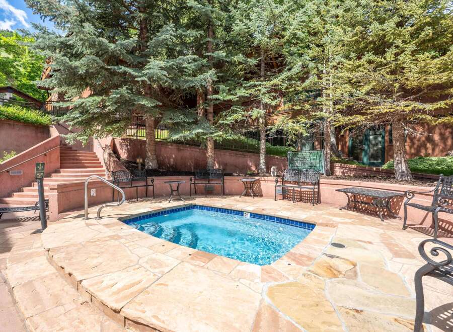 Enjoy a relaxing dip in this inviting hot tub, perfect for unwinding after a day of outdoor adventures.