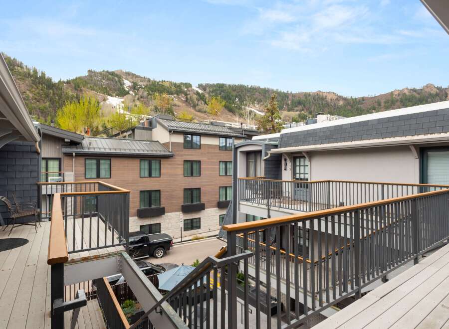 Enjoy breathtaking mountain views from this stunning property, featuring modern architecture and spacious outdoor living areas.