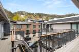 Enjoy breathtaking mountain views from this stunning property, featuring modern architecture and spacious outdoor living areas.