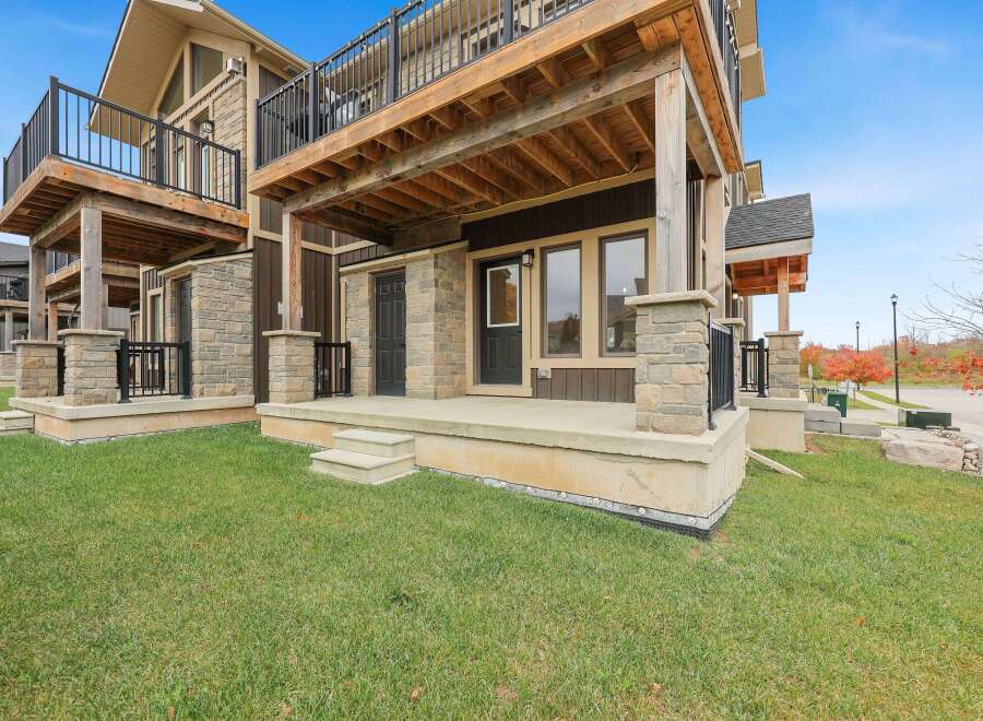 Experience modern living in this stunning townhouse featuring a spacious upper-level deck perfect for entertaining and enjoying the outdoors.