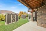 Enjoy the spacious backyard of this property, complete with multiple storage sheds perfect for outdoor equipment and seasonal items.