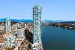 Experience modern urban living in this stunning high-rise apartment complex, boasting breathtaking water and mountain views.