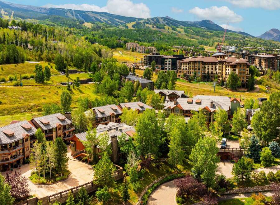 Experience luxury mountain living in this stunning property, nestled amidst lush greenery and rolling hills.