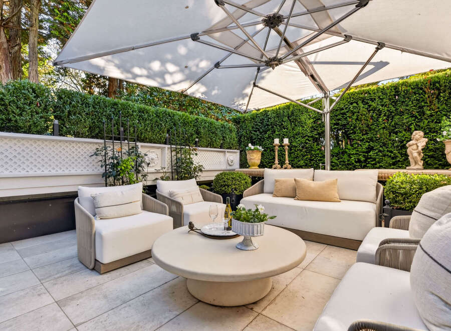 Experience luxurious outdoor living with this beautifully appointed patio space, perfect for entertaining or relaxing.