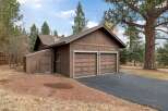 This charming property features a spacious two-car garage with a separate storage shed, perfect for all your needs.