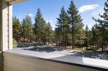 Enjoy the serene mountain views from this property, surrounded by majestic pine trees.