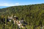 Nestled amidst a dense forest of pine trees, this property offers a serene and private retreat.
