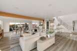 Experience luxurious open-concept living with stunning panoramic views from this beautifully appointed home.