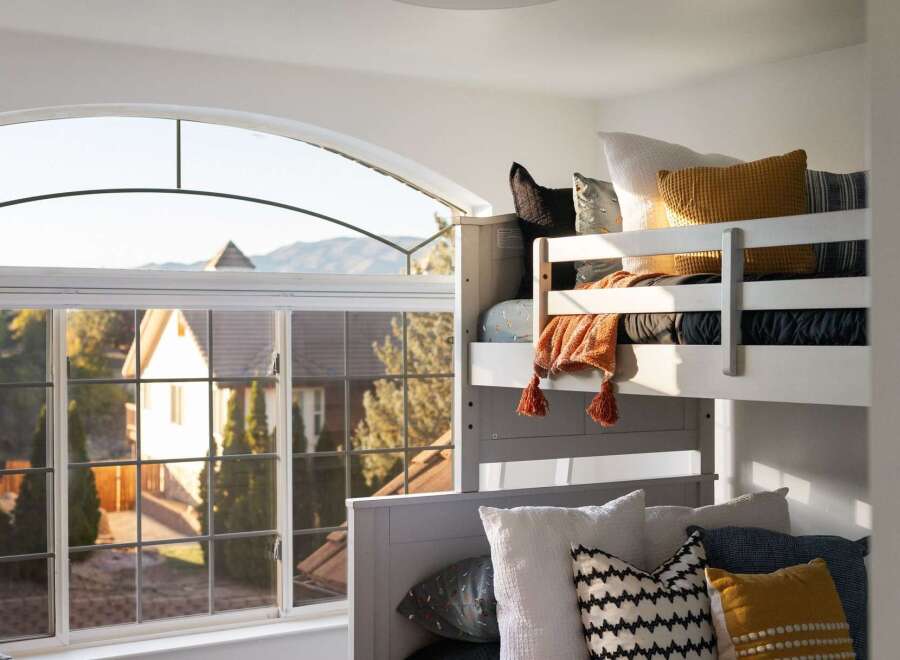 Experience comfortable living in this charming home featuring a spacious bunk bed setup, perfect for families or guests.