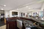 Step into this versatile finished basement, perfect for entertainment and fitness.