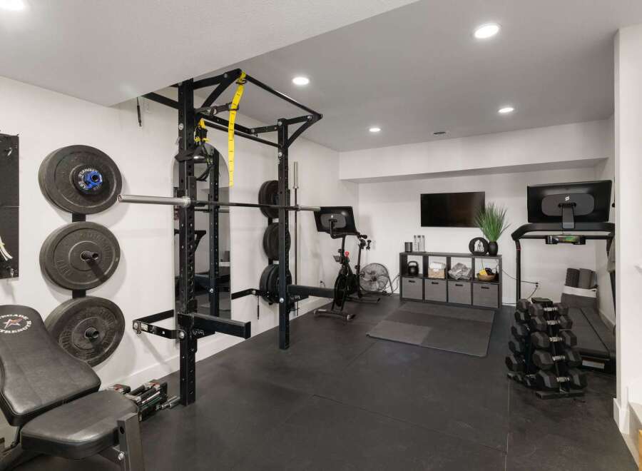 Transform your home into a personal fitness sanctuary with this fully equipped gym.
