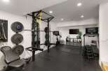 Transform your home into a personal fitness sanctuary with this fully equipped gym.