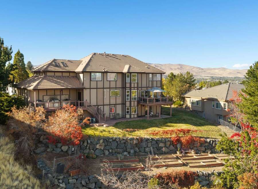 Discover this stunning multi-level home featuring expansive decks perfect for entertaining and enjoying the scenic views.