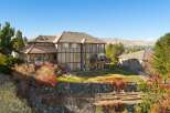 Discover this stunning multi-level home featuring expansive decks perfect for entertaining and enjoying the scenic views.