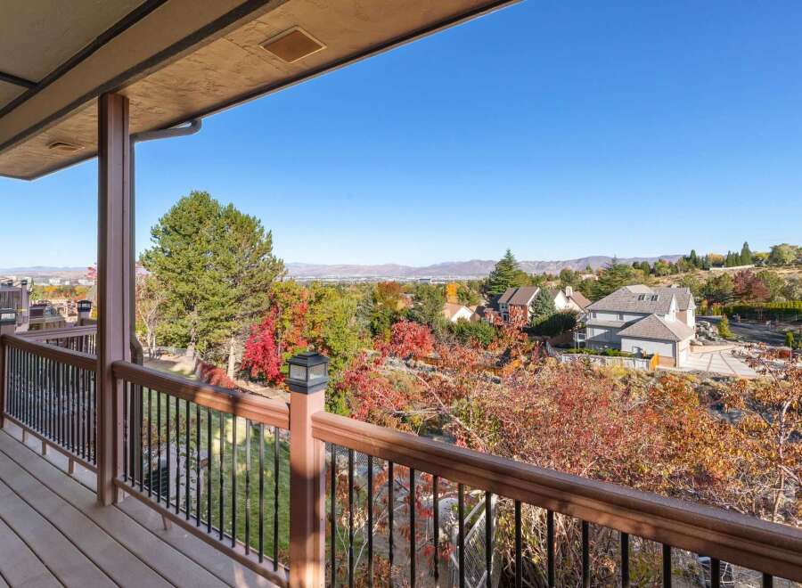 Enjoy breathtaking panoramic views from this stunning property, perfect for appreciating the vibrant autumn foliage.