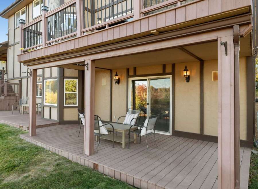 Enjoy outdoor living on this spacious deck, perfect for entertaining or relaxing.