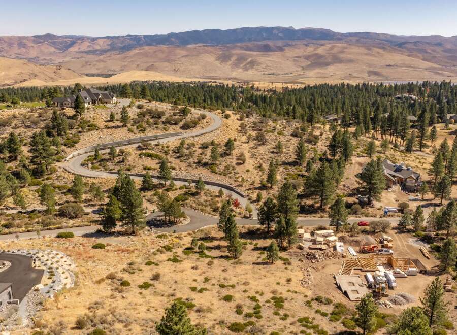 Discover luxury living in this stunning estate nestled amidst rolling hills and mature pine trees.