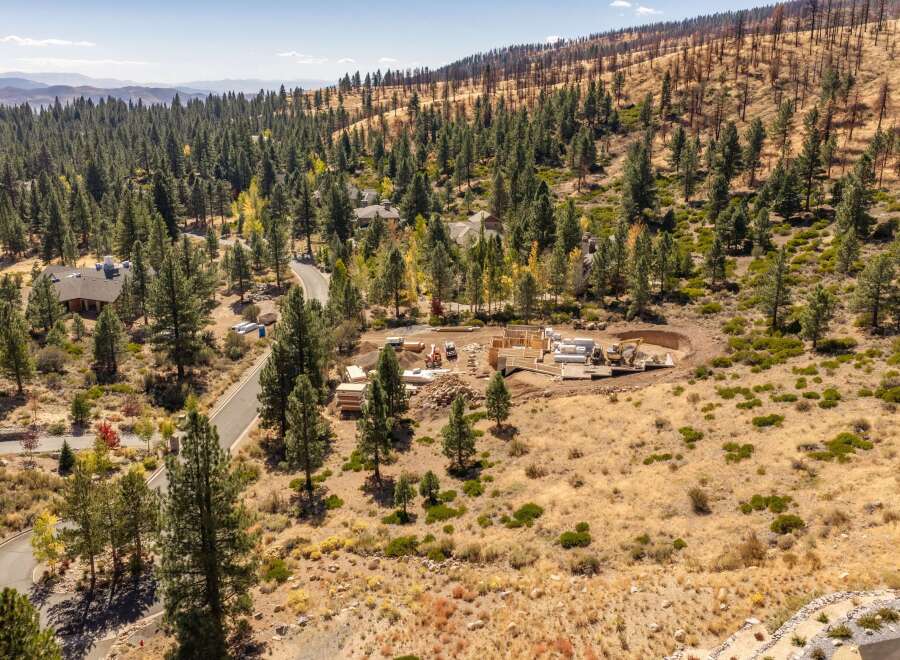 Discover this stunning property nestled in a serene, wooded landscape.
