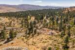 Discover your dream home in this picturesque setting, nestled among mature pine trees with stunning mountain views.