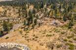 Discover this stunning property nestled amidst a serene pine forest, offering breathtaking natural beauty and privacy.