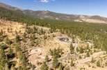Discover your dream home nestled in a serene mountain landscape.