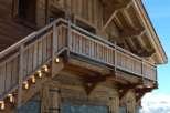 This stunning chalet boasts a beautiful wooden exterior with exposed beams and stonework.