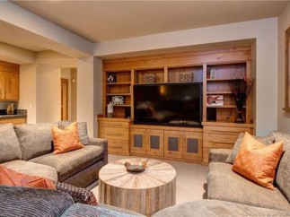 This stunning property boasts a spacious, light-filled family room, perfect for relaxation and entertainment.