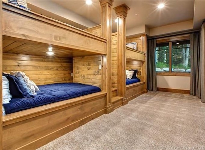This stunning property boasts a spacious bunk room, perfect for families or groups.
