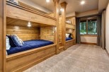 This stunning property boasts a spacious bunk room, perfect for families or groups.