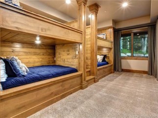 This stunning property boasts a spacious bunk room, perfect for families or groups.