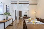 This stunning home boasts an open-concept living area with hardwood floors and abundant natural light.