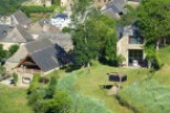 This charming stone house boasts a spacious balcony, large windows offering stunning views, and a private garden.