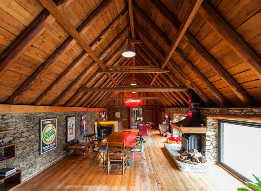 Rustic charm meets modern comfort in this unique loft space.