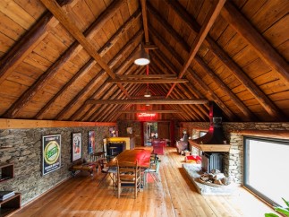 Rustic charm meets modern comfort in this unique loft space.