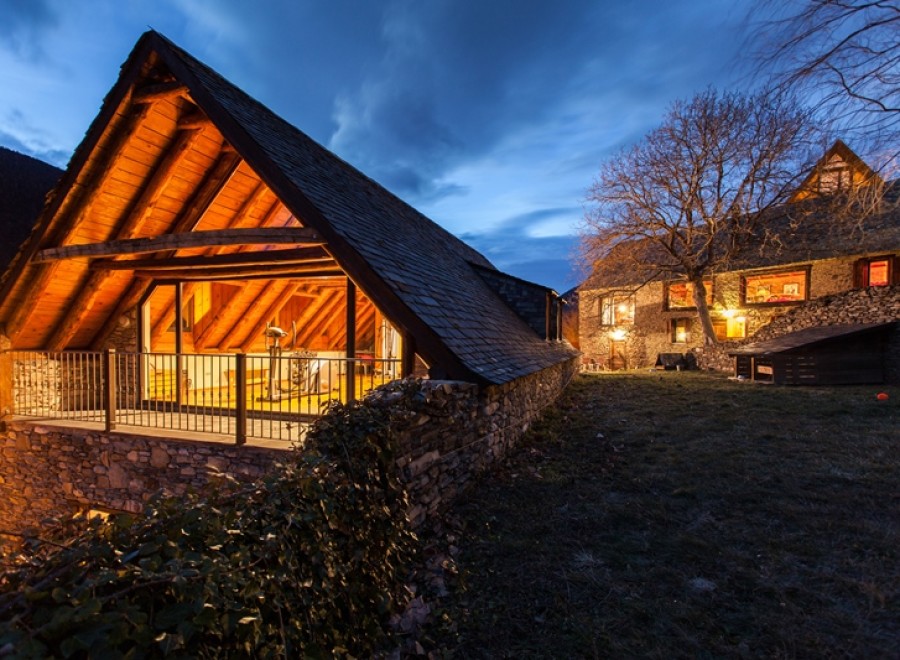 This stunning property boasts a unique A-frame design with a spacious, open-plan interior, perfect for entertaining.