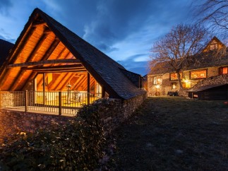 This stunning property boasts a unique A-frame design with a spacious, open-plan interior, perfect for entertaining.
