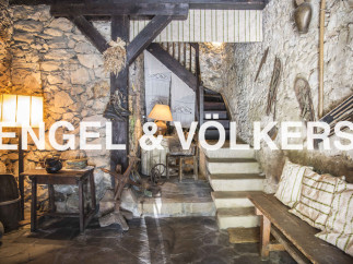 Rustic charm meets modern comfort in this unique stone house.