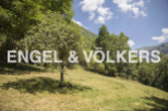Discover this idyllic plot of land nestled in a serene mountain setting.