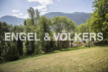 Mountain view property with large green space.