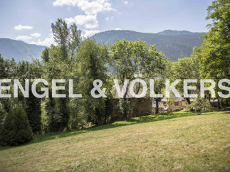 Mountain view property with large green space.