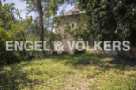 Discover this charming stone house nestled amidst lush greenery, offering a tranquil escape.