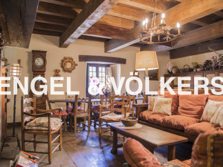 Rustic charm meets modern comfort in this stunning property.