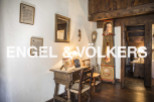 This charming property boasts unique antique furniture and decor, creating a cozy and inviting atmosphere.