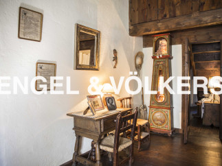 This charming property boasts unique antique furniture and decor, creating a cozy and inviting atmosphere.